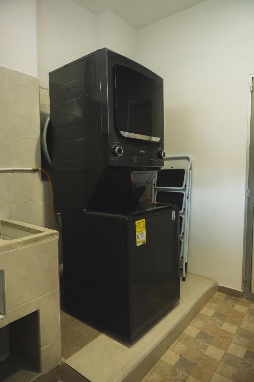 Kuchyň nebo kuchyňský kout v ubytování Casa Serena