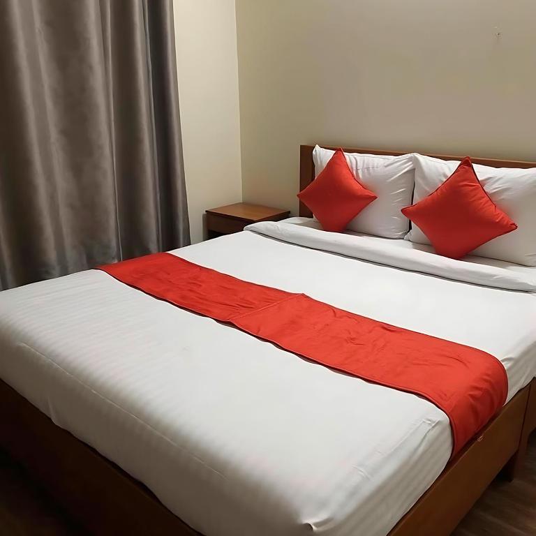 Postel nebo postele na pokoji v ubytování Setha Waves