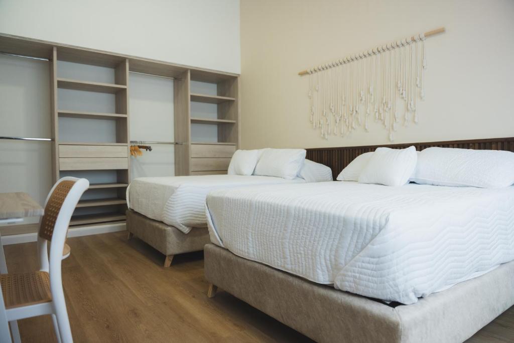 Postel nebo postele na pokoji v ubytování Casa Serena