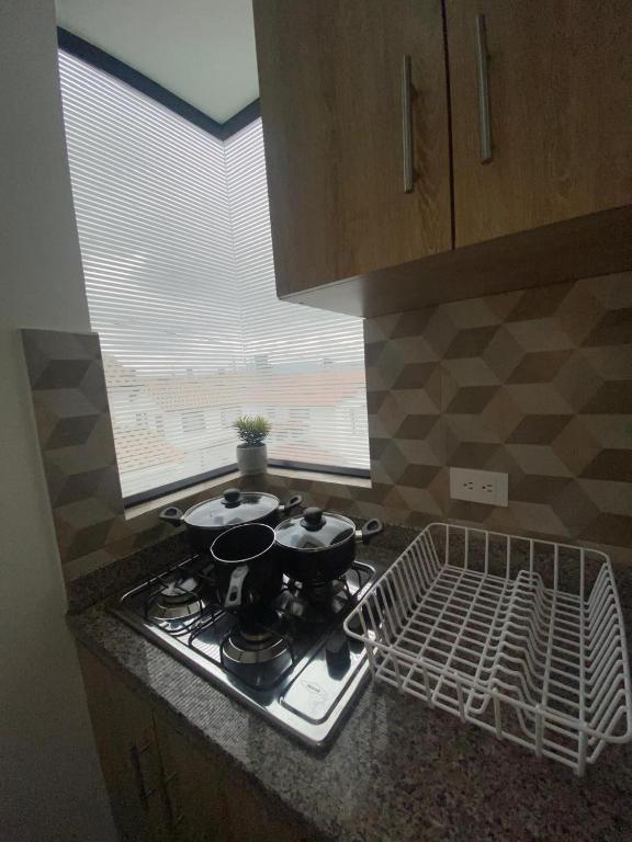 Kuchyň nebo kuchyňský kout v ubytování Apartamento Entero 203 NUEVO