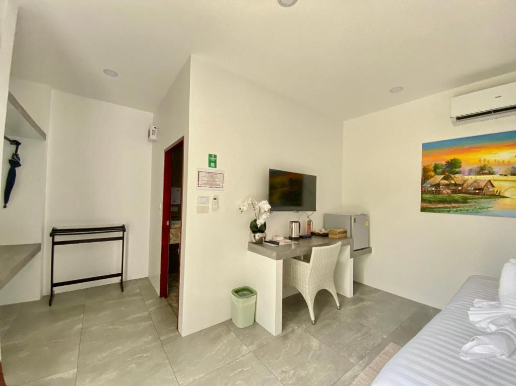 TV a/nebo společenská místnost v ubytování Barong Resort