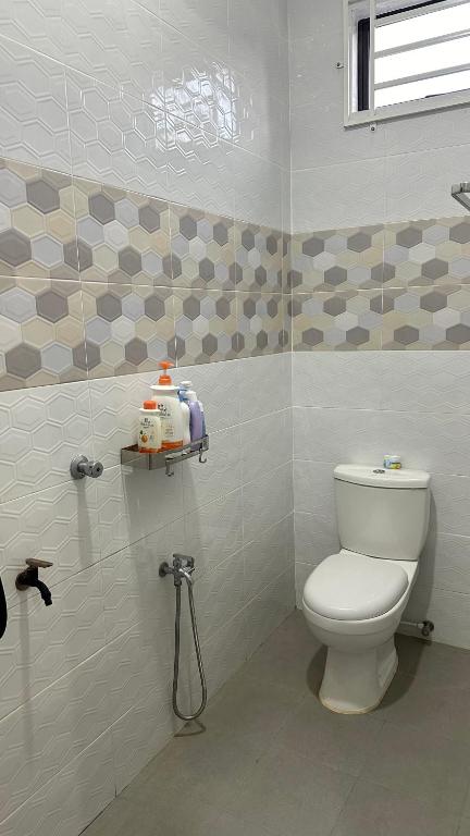 Koupelna v ubytování iDesa Homestay