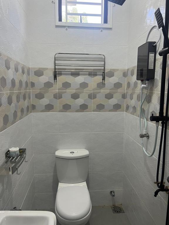 Koupelna v ubytování iDesa Homestay