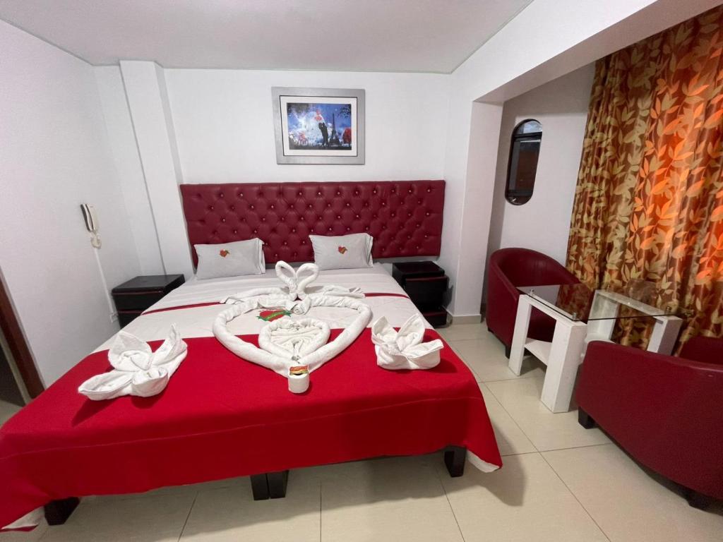 Ένα ή περισσότερα κρεβάτια σε δωμάτιο στο Hostal Amazonas