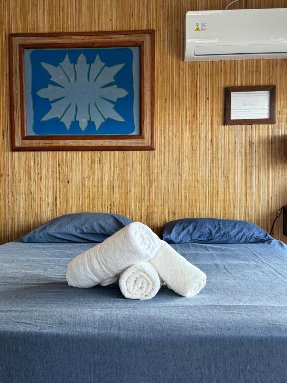 Voodi või voodid majutusasutuse Vahaui Paradis toas