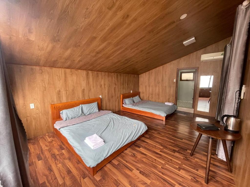 Postel nebo postele na pokoji v ubytování Chang's home