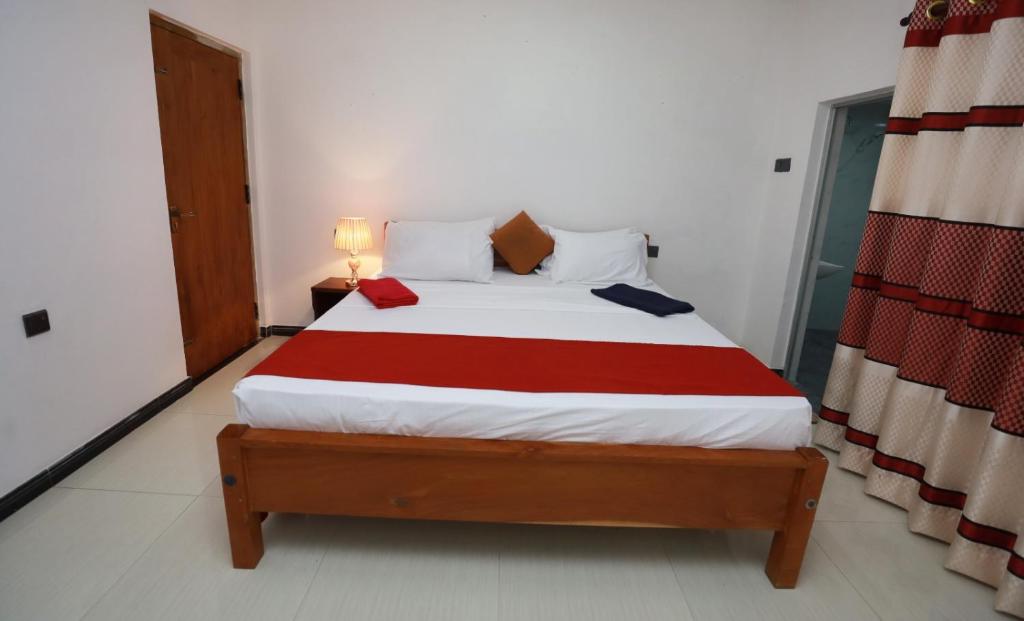 Postel nebo postele na pokoji v ubytování Alankulama Wana Resort