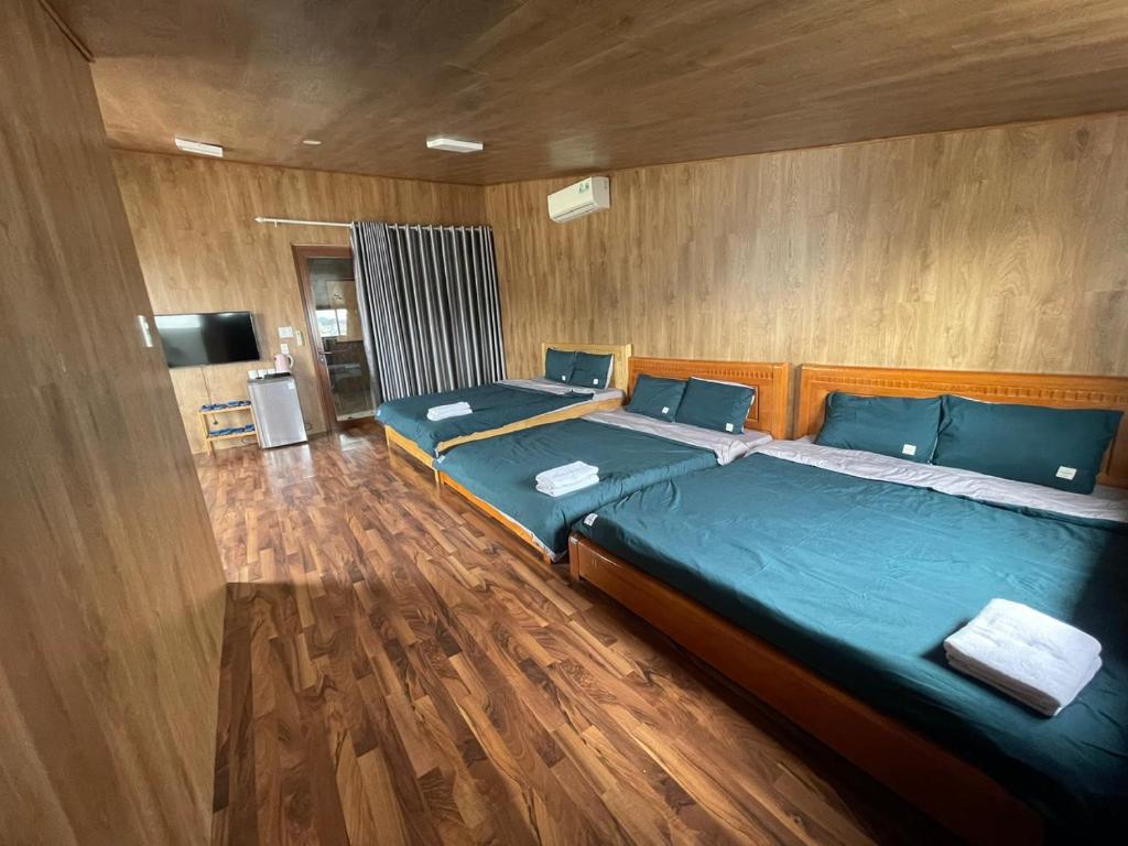 Postel nebo postele na pokoji v ubytování Chang's home