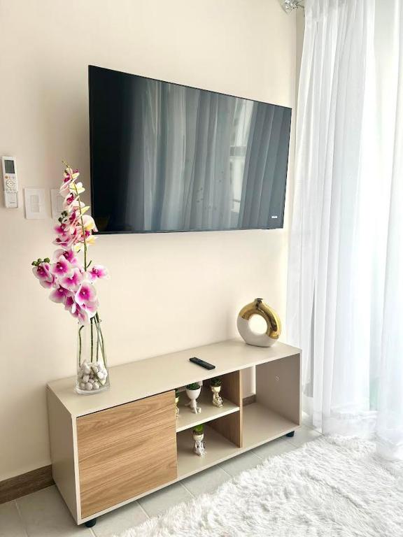 TV a/nebo společenská místnost v ubytování Loft Chic en Cipreses