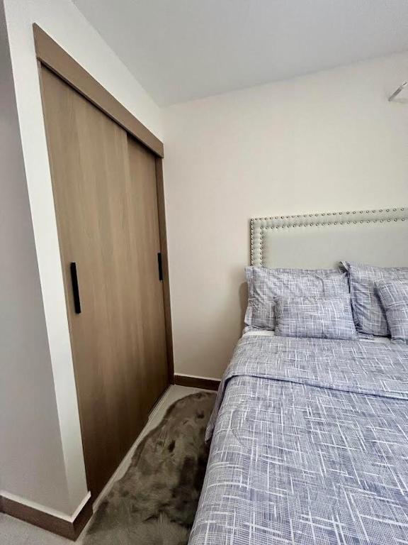 Postel nebo postele na pokoji v ubytování Loft Chic en Cipreses