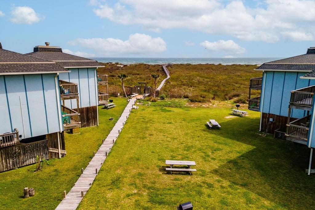 an aerial view of a yard between two houses at Casa Sea-Esta - OCEAN VIEWS in Port Aransas