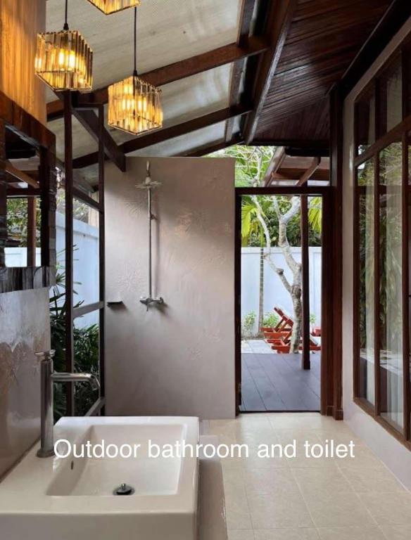 Ein Badezimmer in der Unterkunft Green Papaya Beach Resort, Koh Phangan