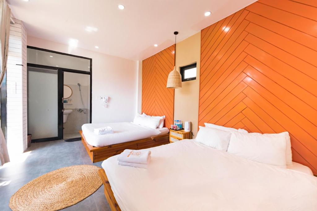 Giường trong phòng chung tại Be Youth Villa Đà Lạt - O'TEL