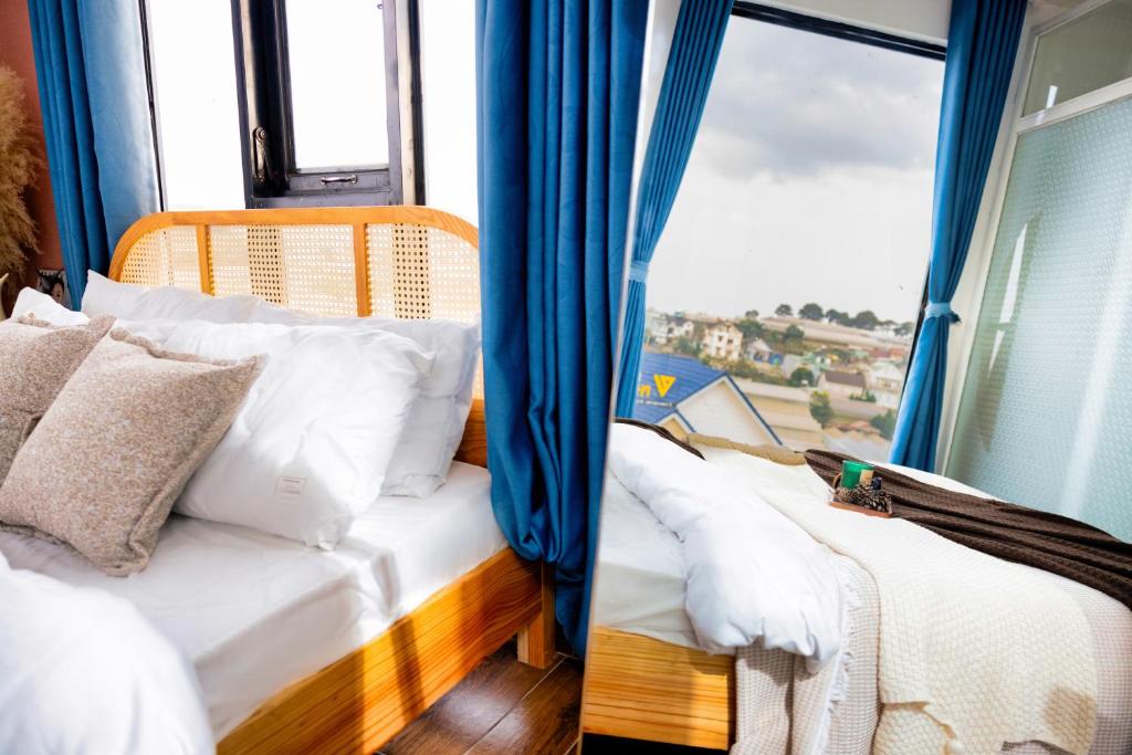 Giường trong phòng chung tại Be Youth Villa Đà Lạt - O'TEL