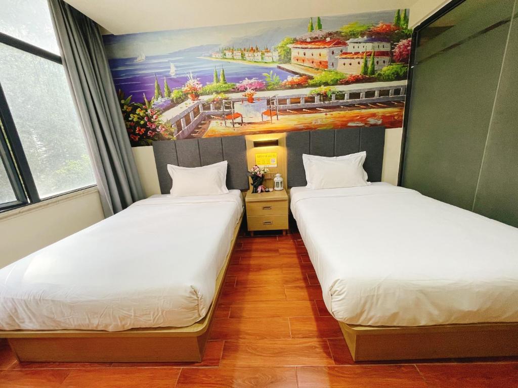 Postel nebo postele na pokoji v ubytování EMi Hotel Guangzhou International Convention and Exhibition Center Guangzhou Tower Branch
