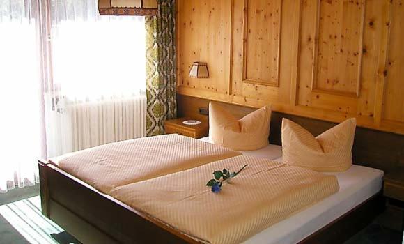 Postel nebo postele na pokoji v ubytování Berghaus Maria
