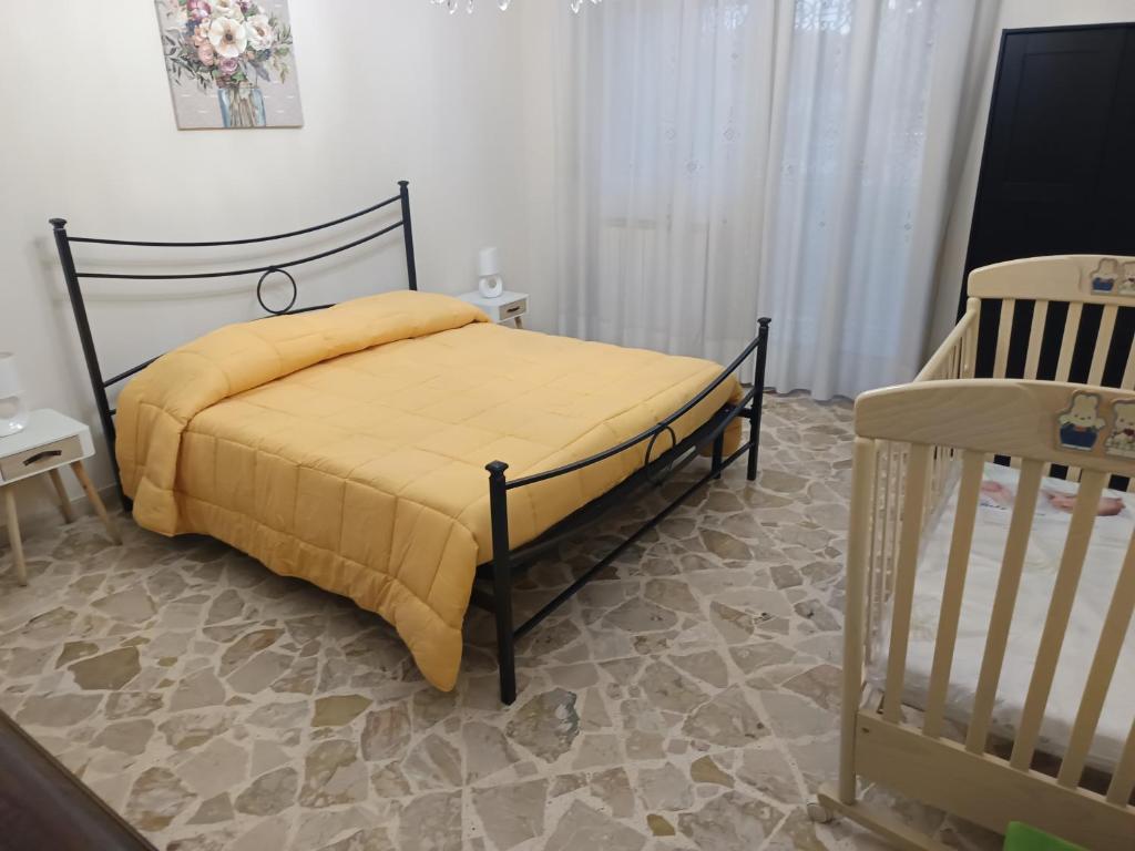 Katil atau katil-katil dalam bilik di New Dawn Apartment, Appartamento Turistico, casa per vacanza, tre camere indipendenti