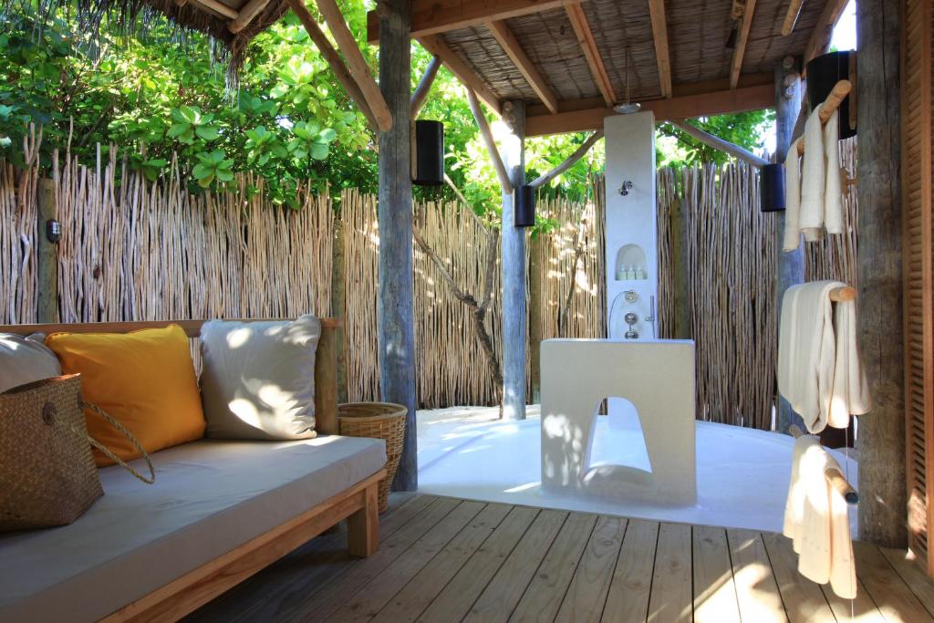 Posezení v ubytování Six Senses Laamu