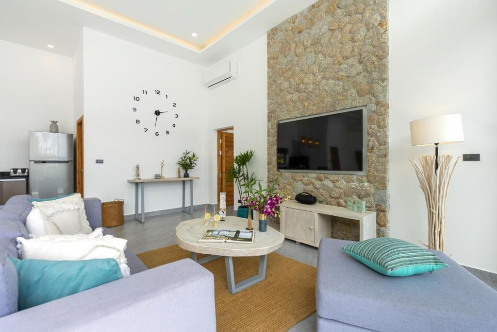 TV a/nebo společenská místnost v ubytování VILLA CLARISSE - SEAVIEW - 4 Bedrooms