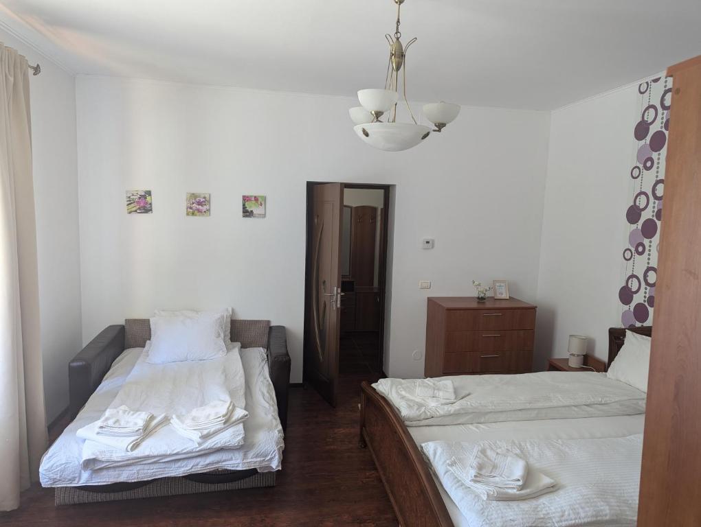 Postel nebo postele na pokoji v ubytování Casa Alex