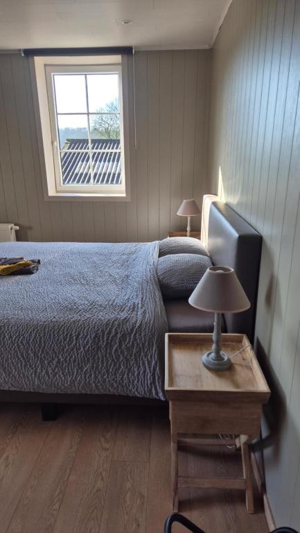 Postel nebo postele na pokoji v ubytování B&B De Dulle Koe