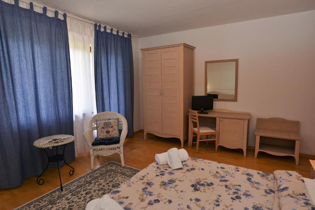 Postel nebo postele na pokoji v ubytování Hotel Marianna