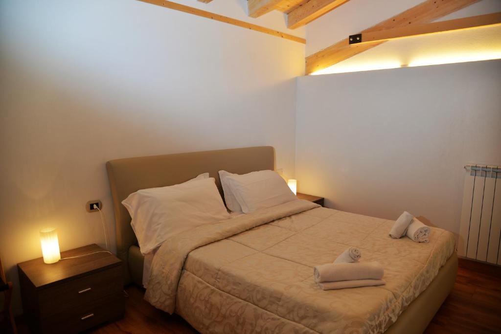 Postel nebo postele na pokoji v ubytování Hotel Marianna