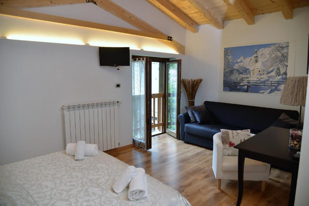 Postel nebo postele na pokoji v ubytování Hotel Marianna
