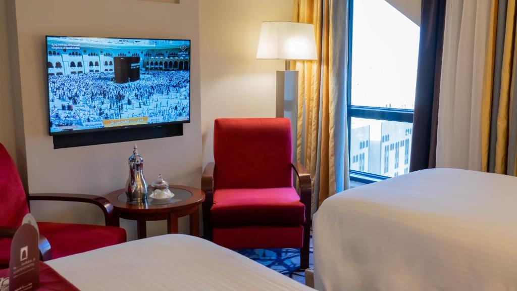 TV a/nebo společenská místnost v ubytování فندق الصفوة البرج الثالث Al Safwah Hotel Third Tower 3
