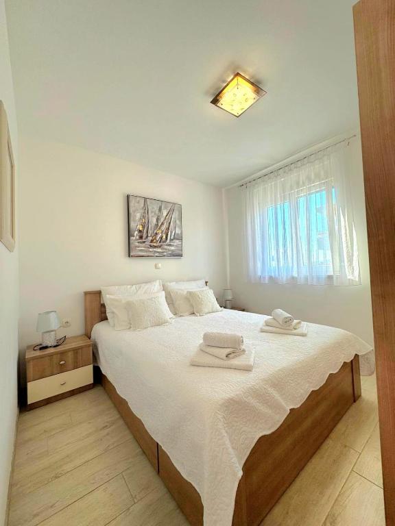 Posteľ alebo postele v izbe v ubytovaní Apartment Mišić