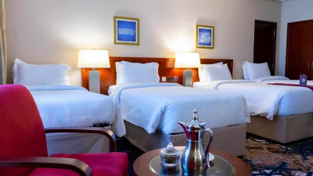 Postel nebo postele na pokoji v ubytování فندق الصفوة البرج الثالث Al Safwah Hotel Third Tower 3