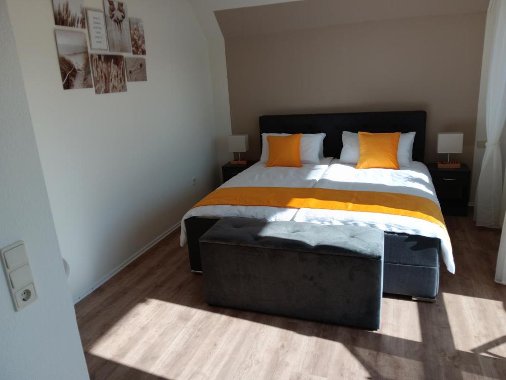 Postel nebo postele na pokoji v ubytování Gästehaus Becker