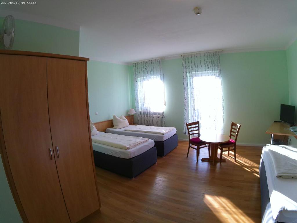 Postel nebo postele na pokoji v ubytování Hotel Thannhof