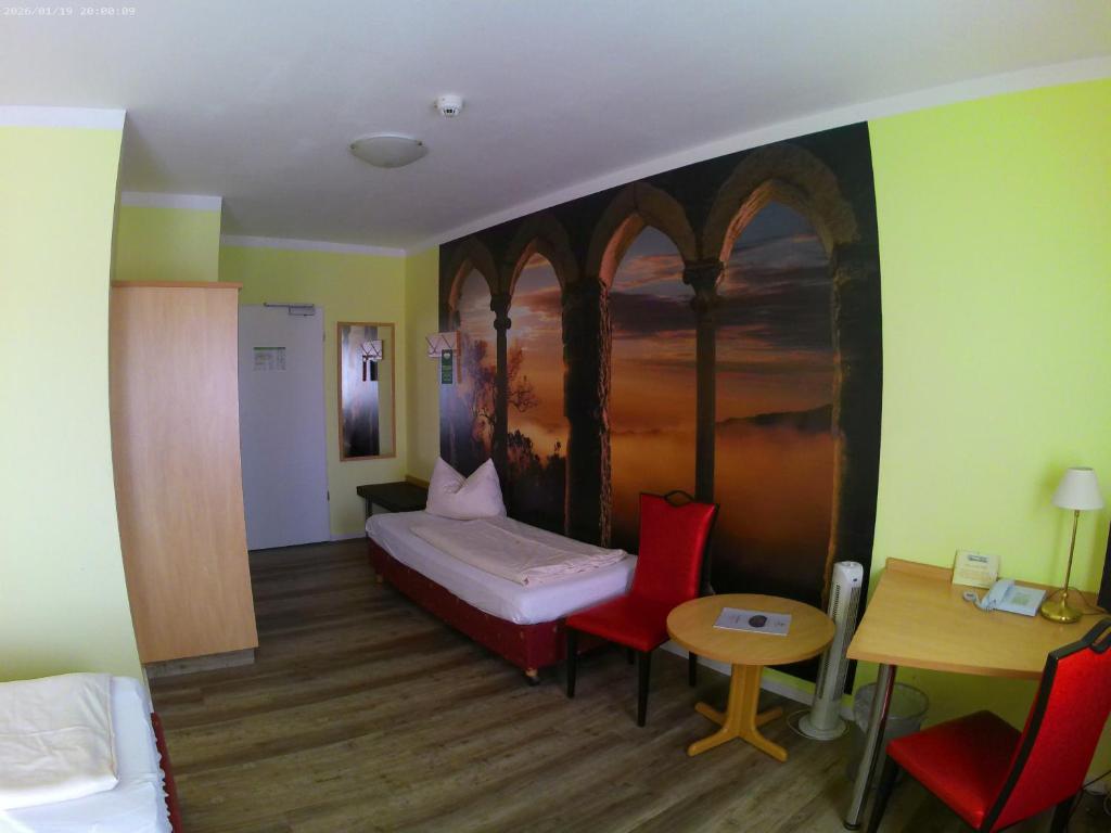Postel nebo postele na pokoji v ubytování Hotel Thannhof