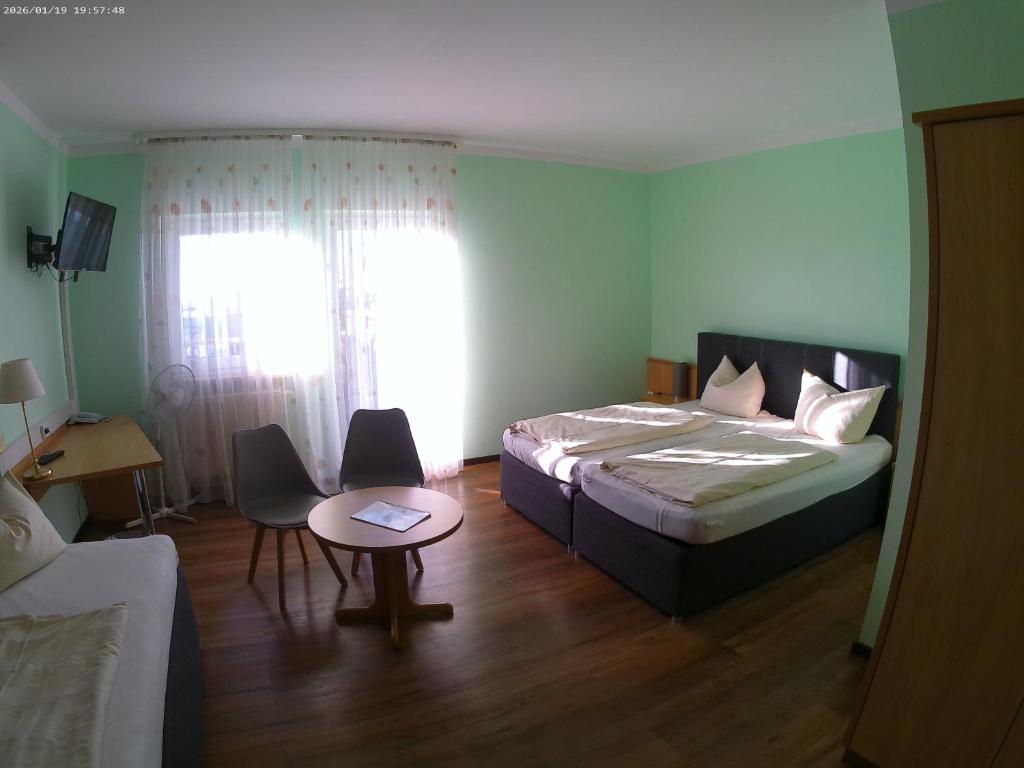 Postel nebo postele na pokoji v ubytování Hotel Thannhof
