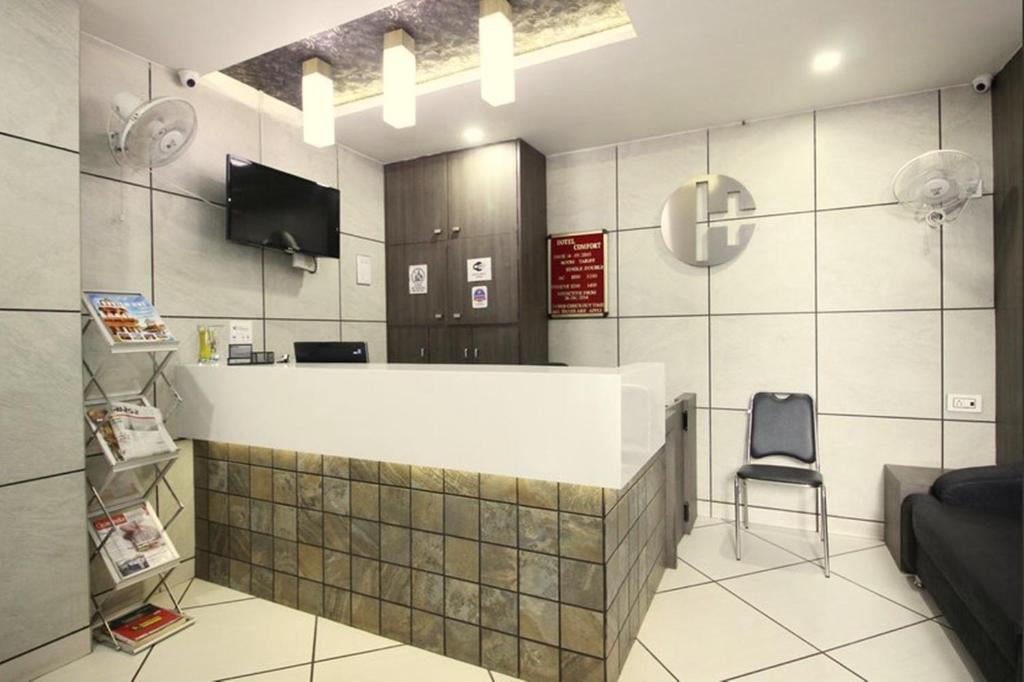 Kuchyň nebo kuchyňský kout v ubytování Hotel City Inn