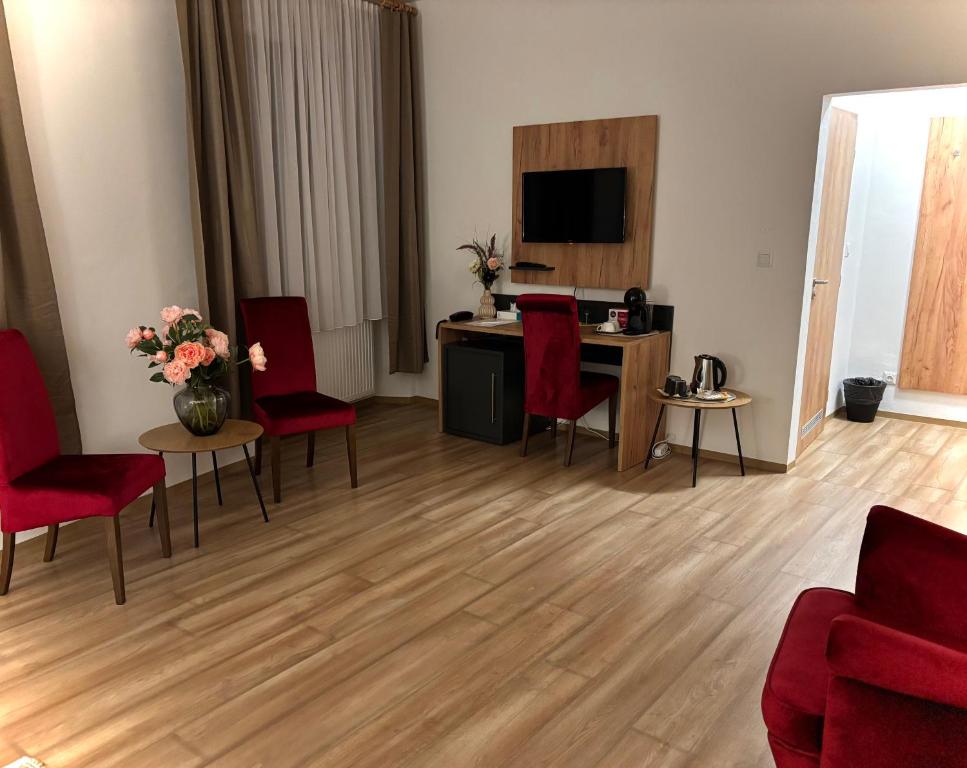 Televiisor ja/või meelelahutuskeskus majutusasutuses Resort Nová Včelnice