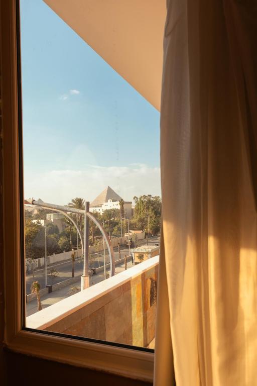 Balkón nebo terasa v ubytování Almas Pyramids Hotel