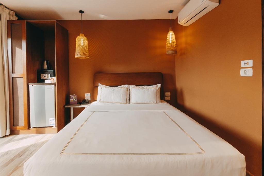 Postel nebo postele na pokoji v ubytování Almas Pyramids Hotel