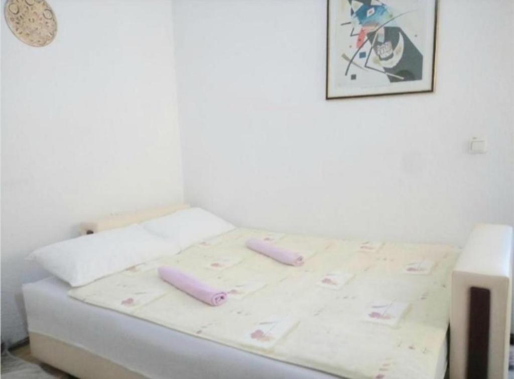 Postel nebo postele na pokoji v ubytování Bus Station Hostel