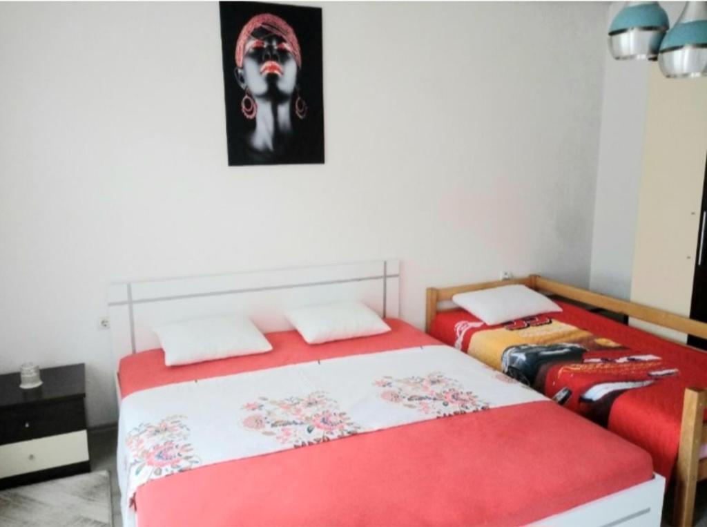 Postel nebo postele na pokoji v ubytování Bus Station Hostel