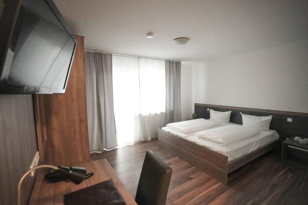 Postel nebo postele na pokoji v ubytování Hotel Altavilla