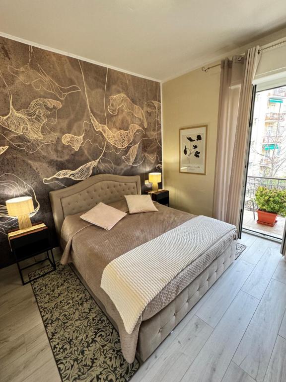 a bedroom with a bed with a stone wall at Verona green harmony in Verona