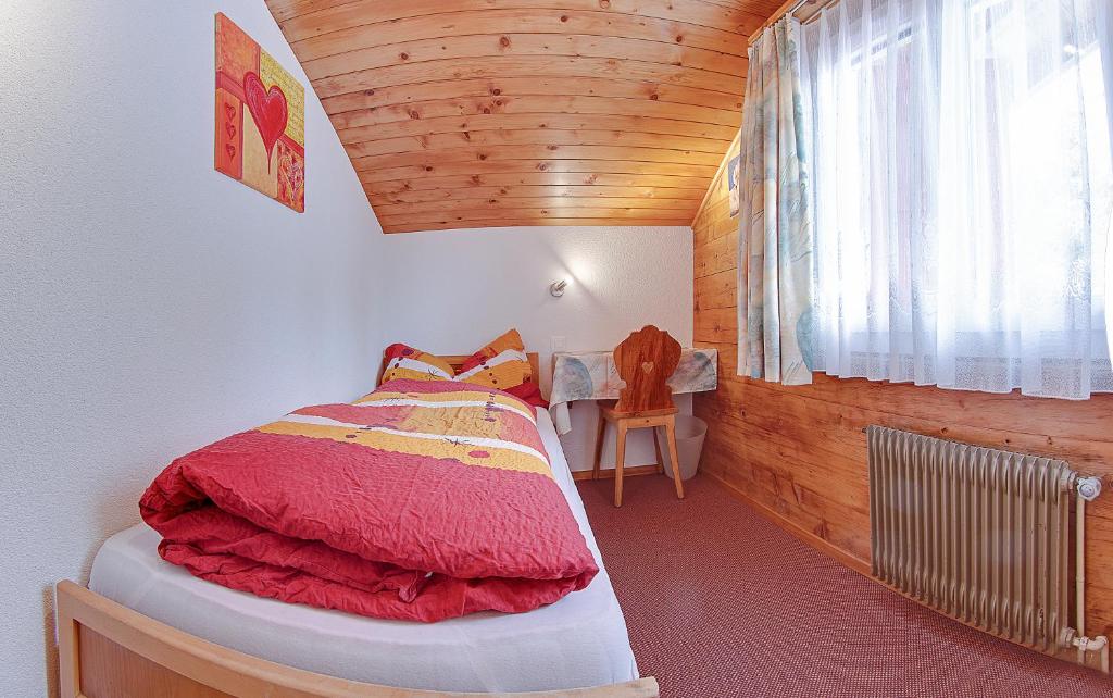 Postel nebo postele na pokoji v ubytování Anemone