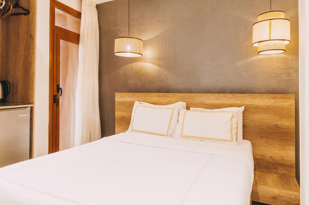 Postel nebo postele na pokoji v ubytování Almas Pyramids Hotel