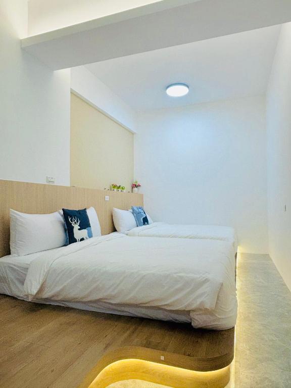 Postel nebo postele na pokoji v ubytování ARK Travel B&B