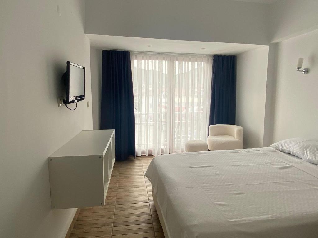 TV a/nebo společenská místnost v ubytování Bouvardia Inn