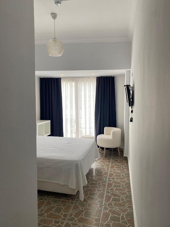 Postel nebo postele na pokoji v ubytování Bouvardia Inn