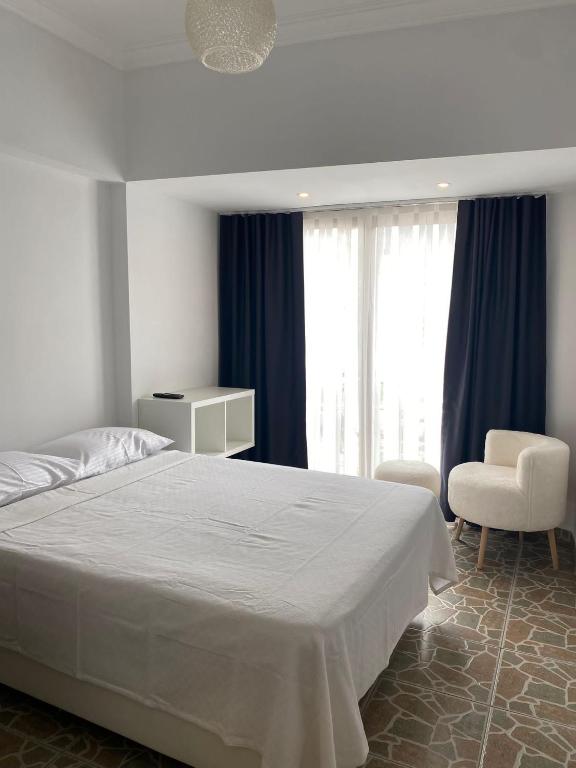 Postel nebo postele na pokoji v ubytování Bouvardia Inn