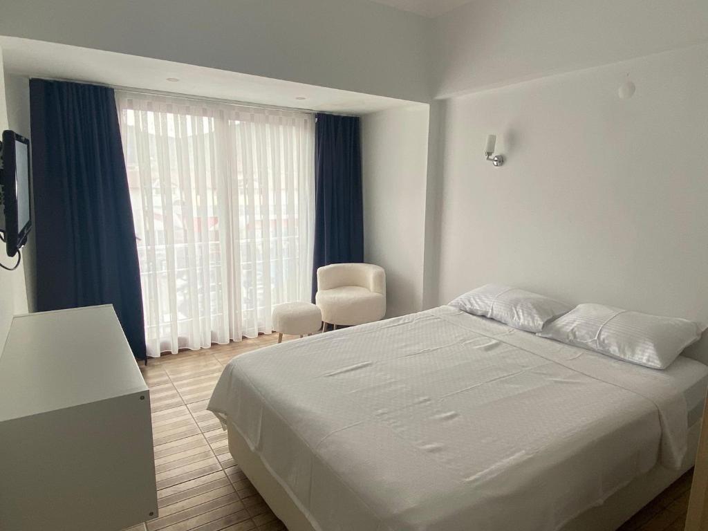Postel nebo postele na pokoji v ubytování Bouvardia Inn